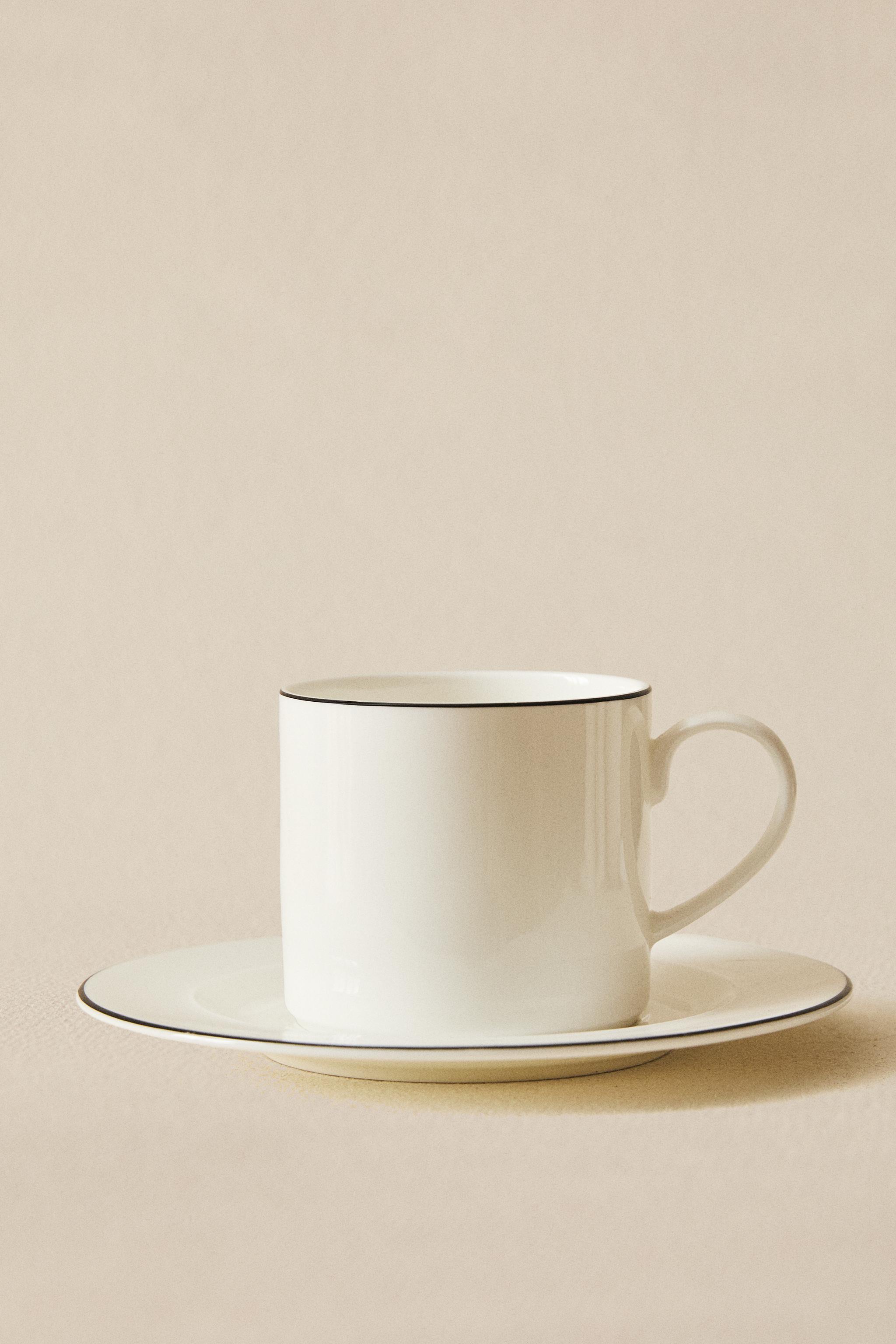 BONE CHINA TEACUP AND SAUCER WITH BLACK RIM